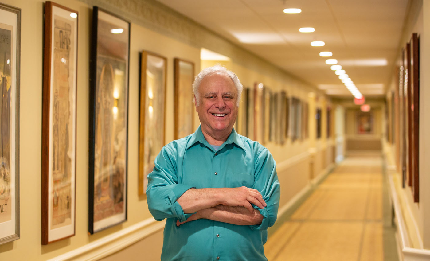 John Lesser with his posters