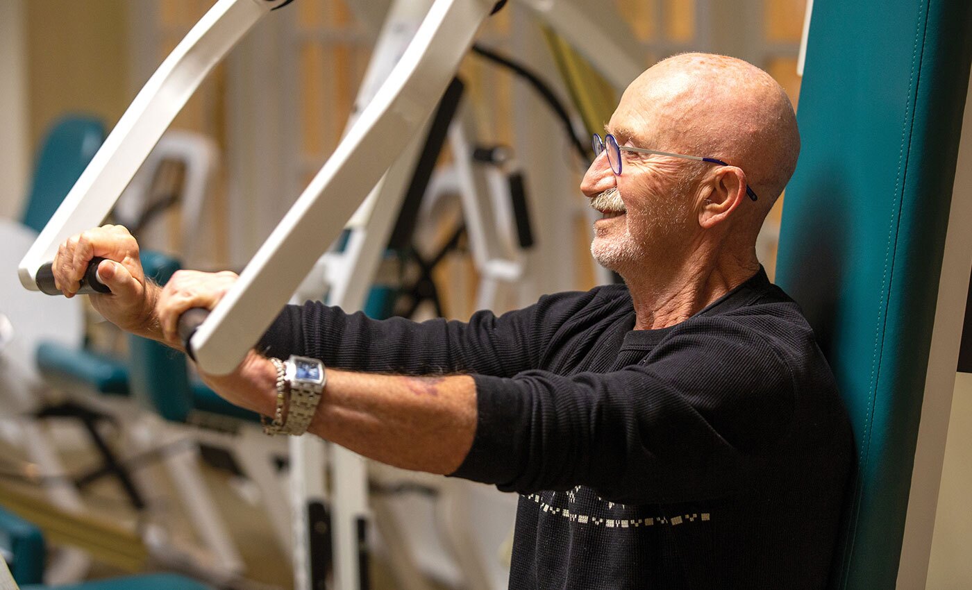 Resident working out in in the gym.