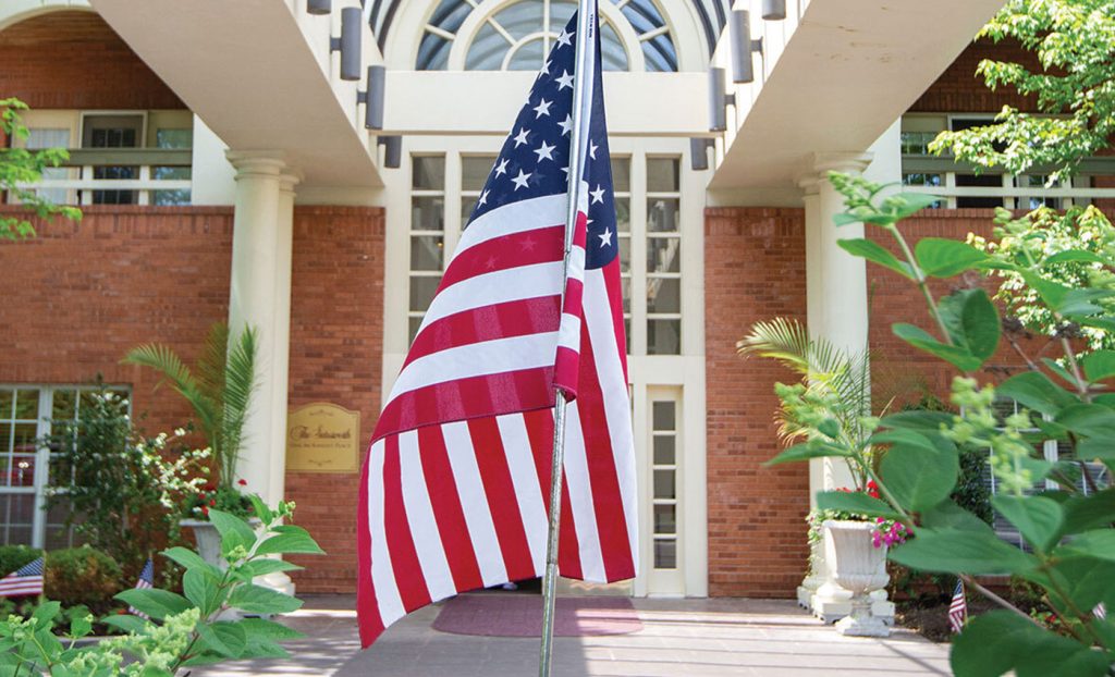 The American flag outside in the entryway.