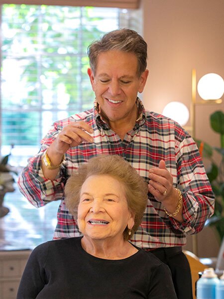 A resident getting their hair done at Spa One.