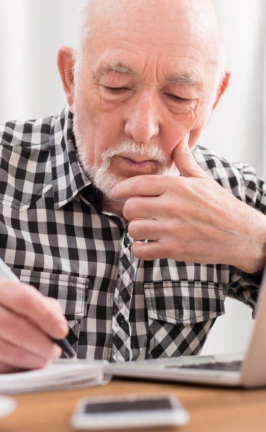 Man writing in notebook