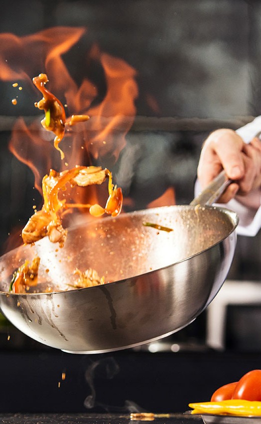 The Gatesworth chef making stir fry.