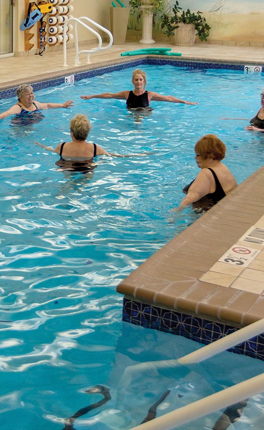 Indoor swimming fitness class.