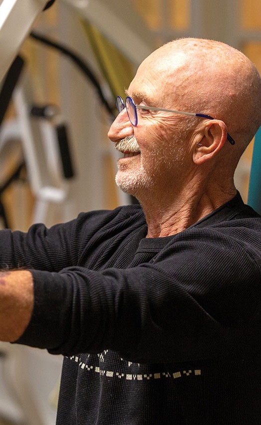 Resident working out in in the gym.