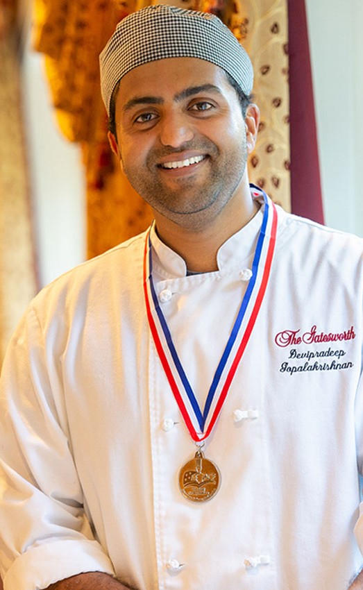 The Gatesworth Junior Chef with a medal.