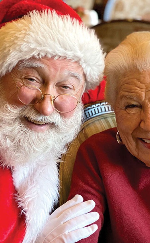 The Gatesworth resident smiling with Santa Claus.