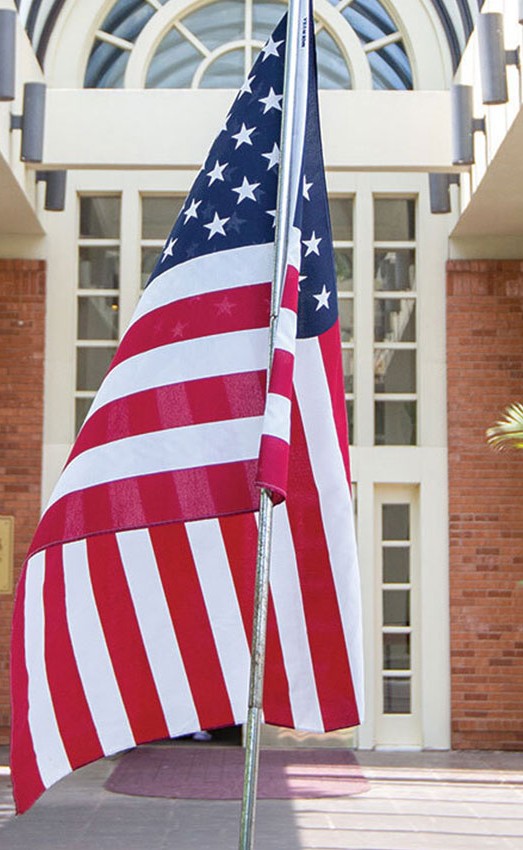 The American flag outside in the entryway.