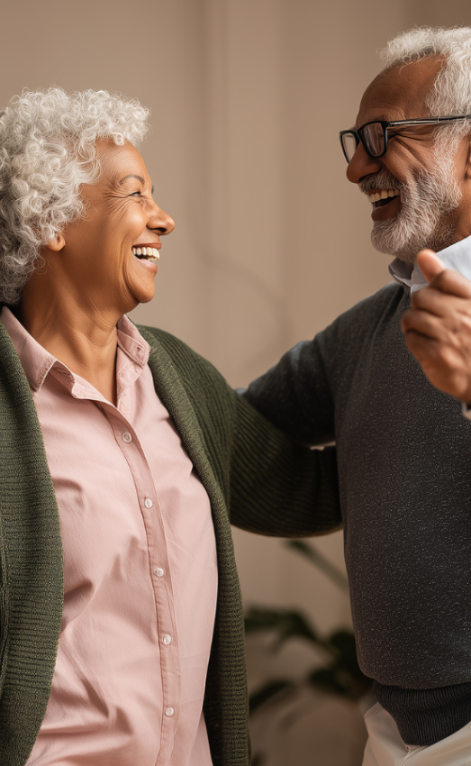 senior couple dancing in their home