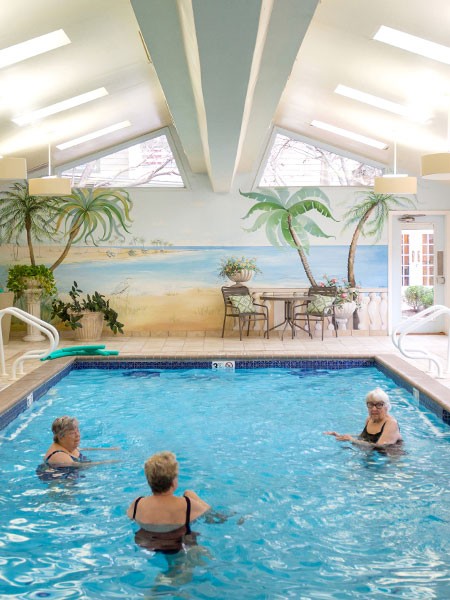 Residents having fun in the indoor pool.