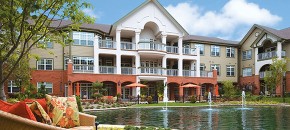 The Gatesworth exterior overlooking pond.