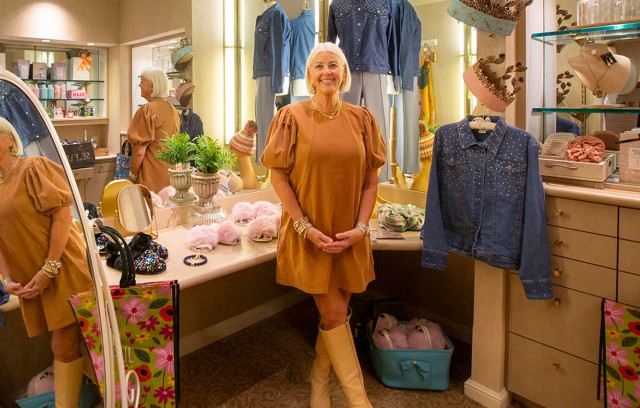 Mary Campbell in Spa One with various items.