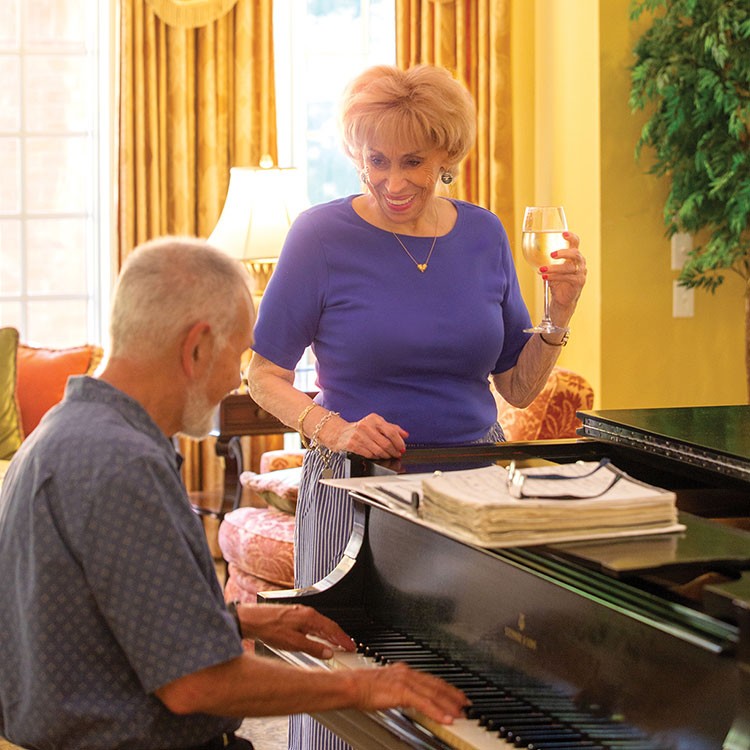 Resident enjoying piano playing.