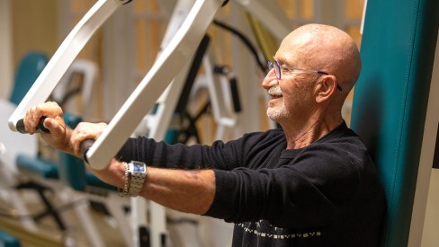 Resident working out in in the gym.