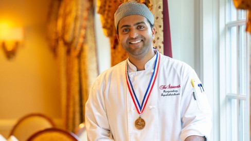 The Gatesworth Junior Chef with a medal.