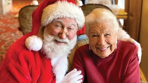 The Gatesworth resident smiling with Santa Claus.