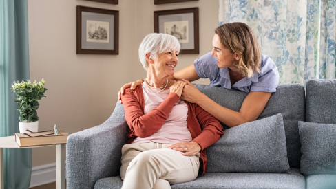older woman and nurse in a senior apartment