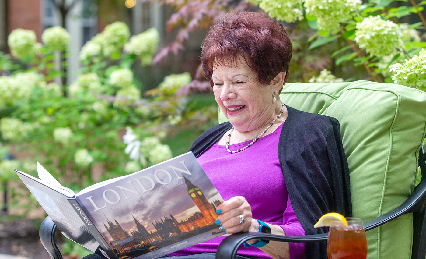 Carol Max reading a book