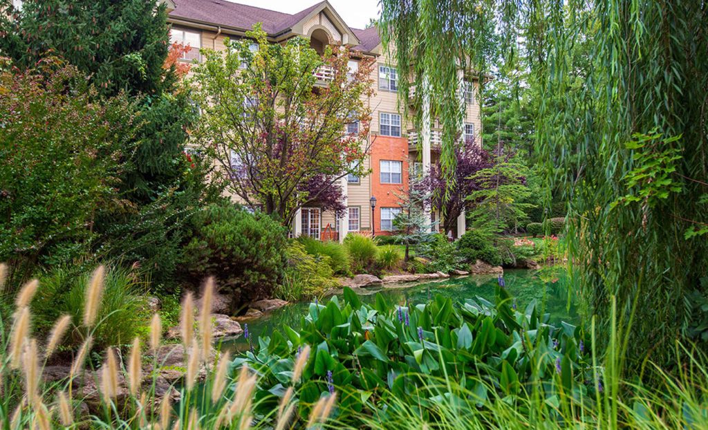 The Gatesworth exterior lush landscaping.