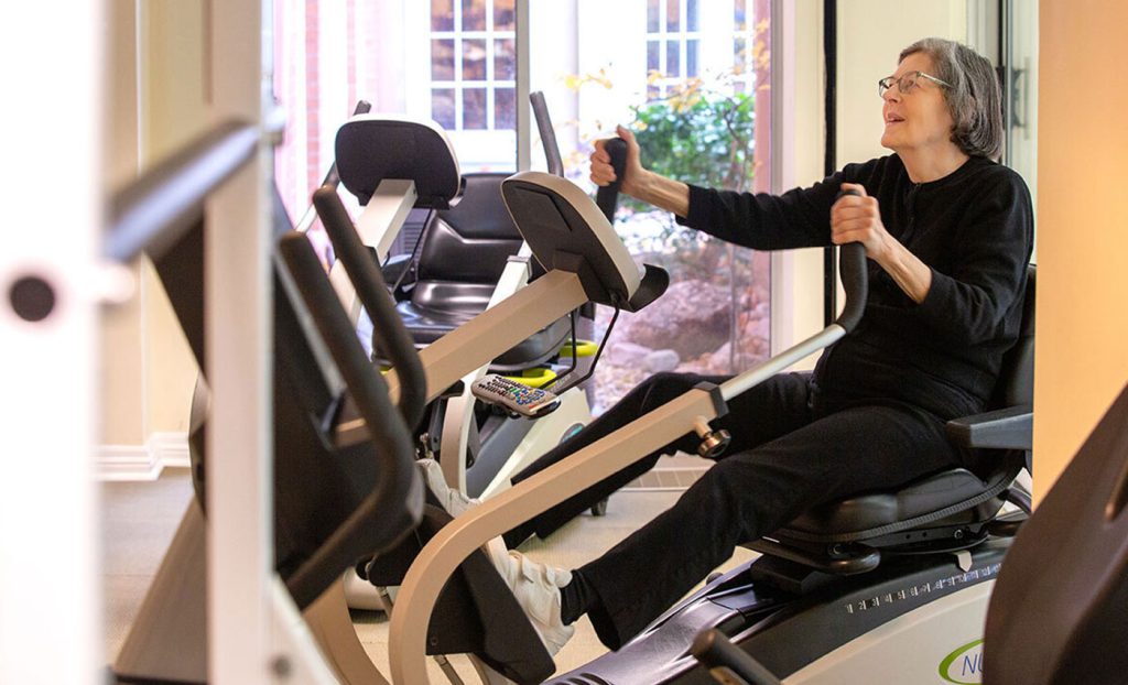 Resident in the gym on exercise machine.