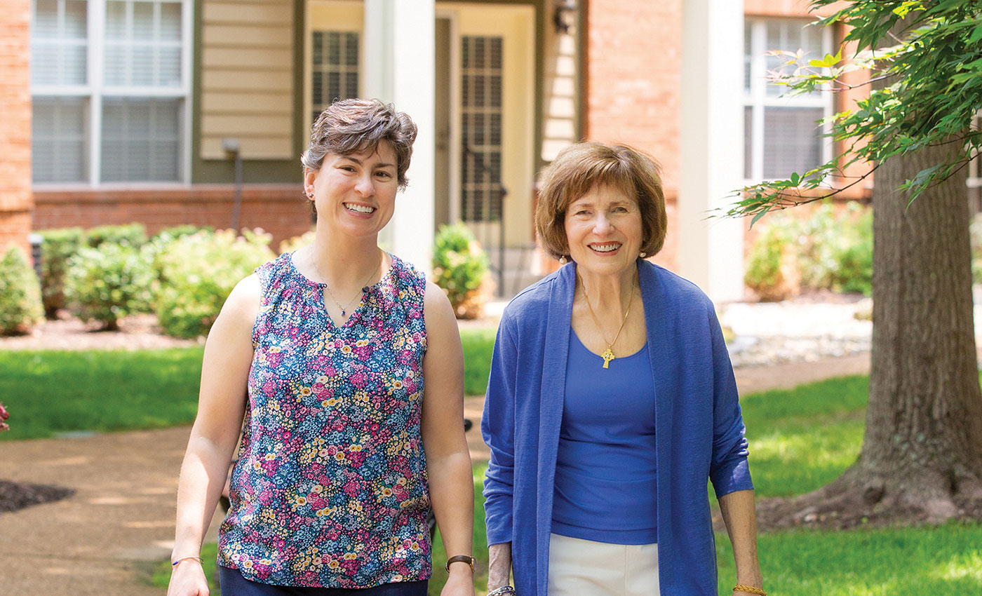 Nancy McEvoy walking outdoors.